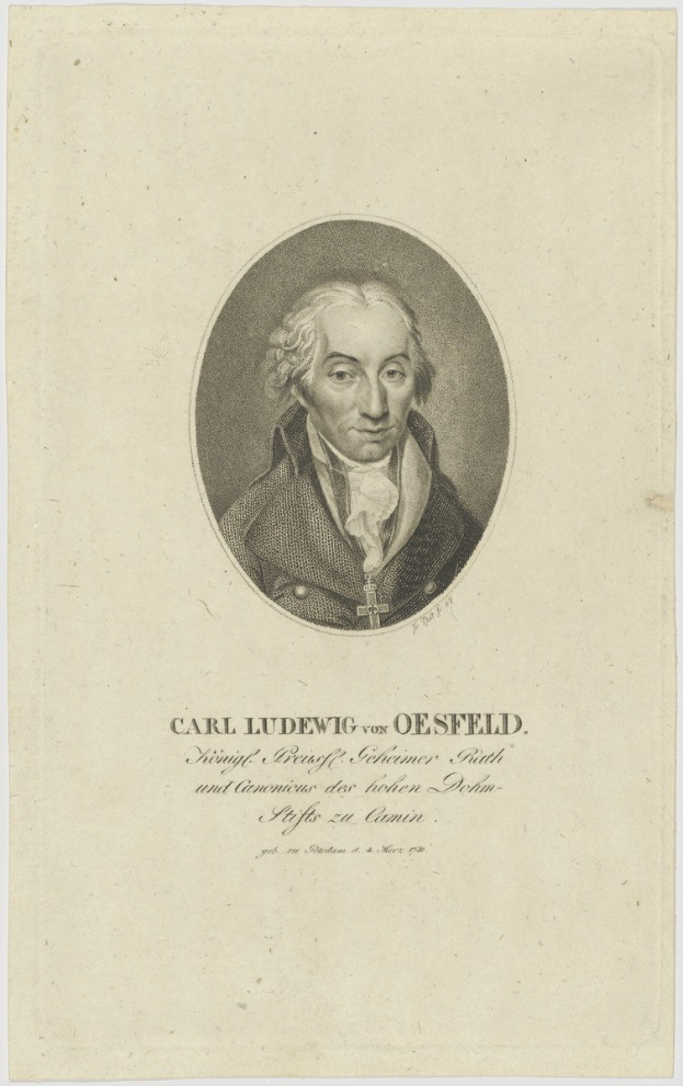Porträt von Carl Ludwig von Oesfeld, ein Mann mit ernstem Gesichtsausdruck, der einen Anzug und eine Krawatte trägt und seine Hände vor der Brust verschränkt, während er direkt in die Kamera schaut.